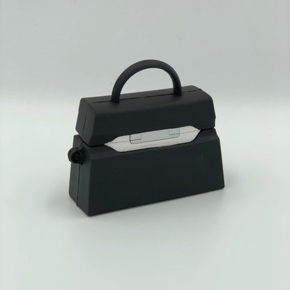 Black Silicone Handbag Airpod Case - Back view.  Apple AirPods and Apple Airpod case are for reference only and are not included