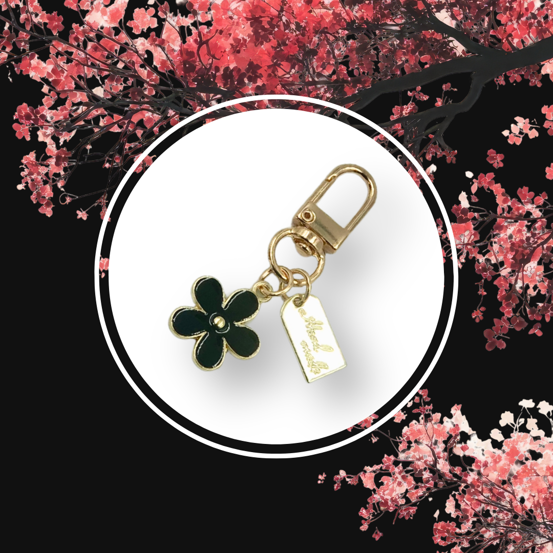 Black Blossom handbag charm with pink blossom branches and black background