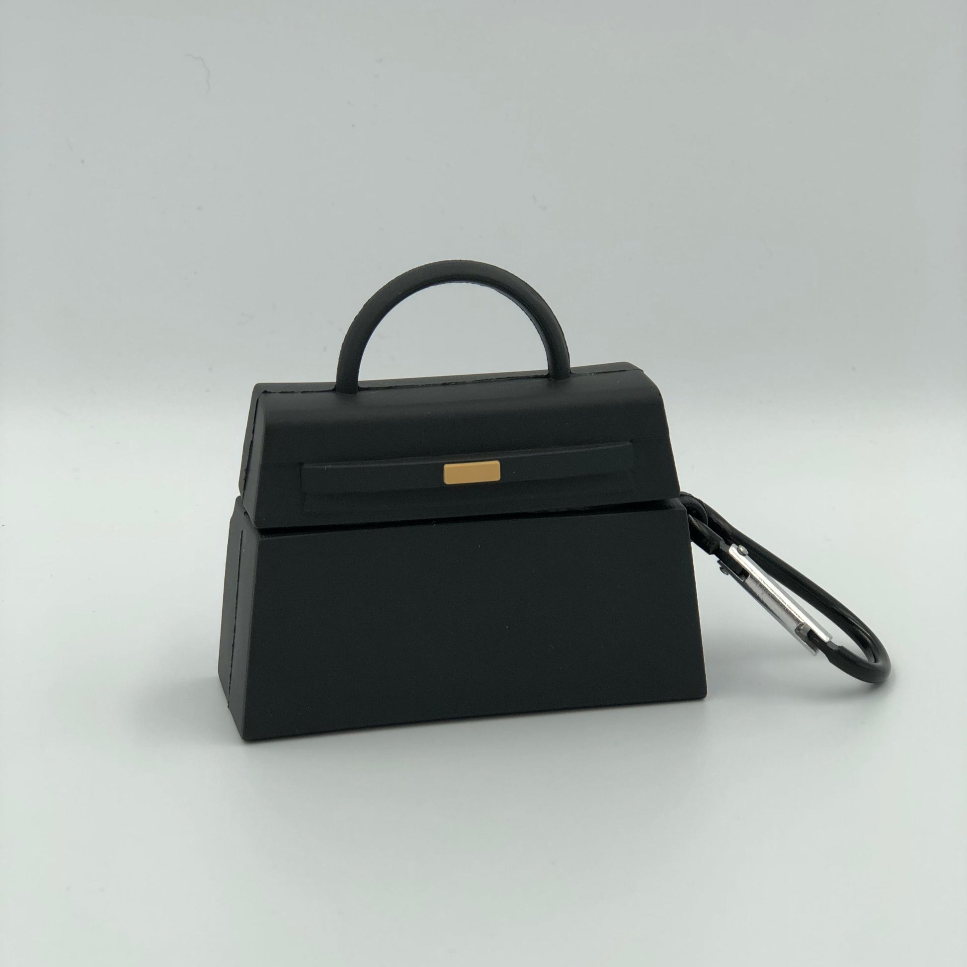 Black Silicone Handbag Airpod Case - Keychain view. Apple AirPods and Apple Airpod case are for reference only and are not included.