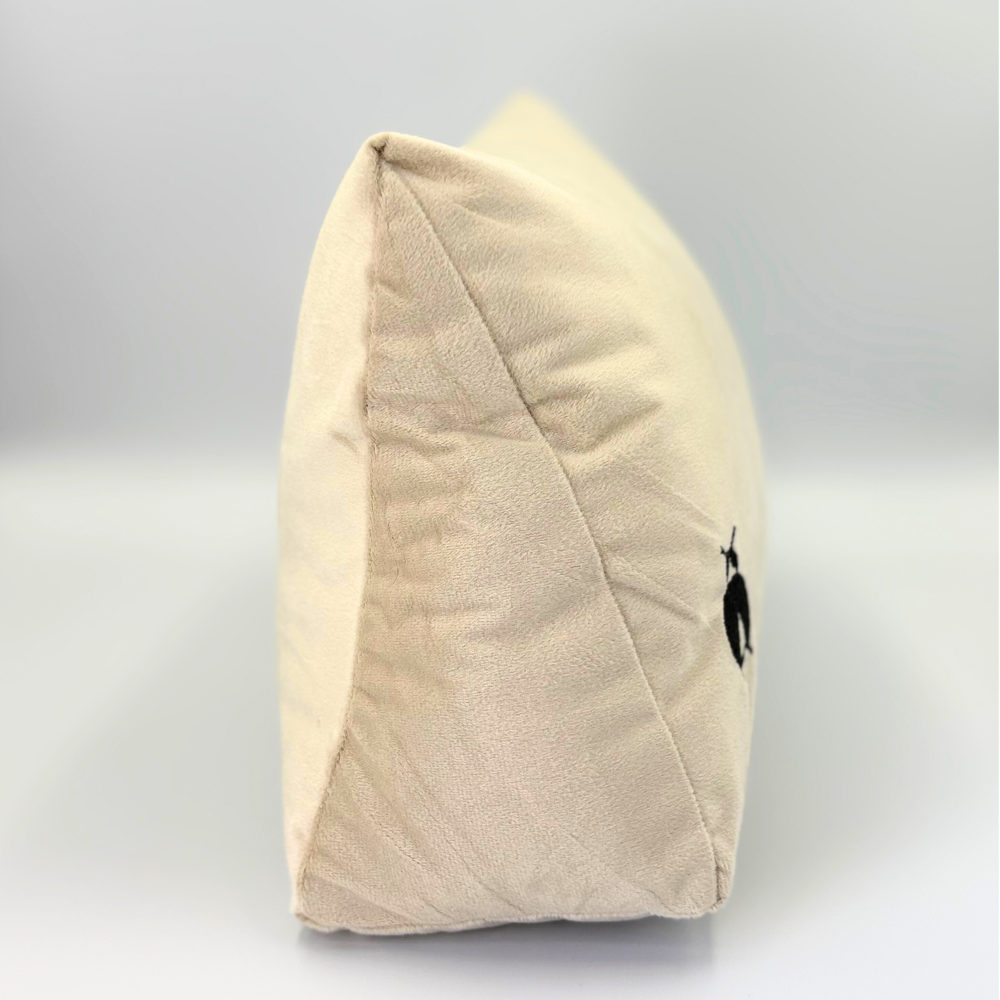 Side of beige Handbag Shaper on grey background