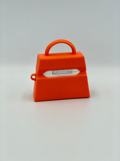 Orange Silicone Handbag Airpod Case - Back view. Apple AirPods and Apple Airpod case are for reference only and are not included.