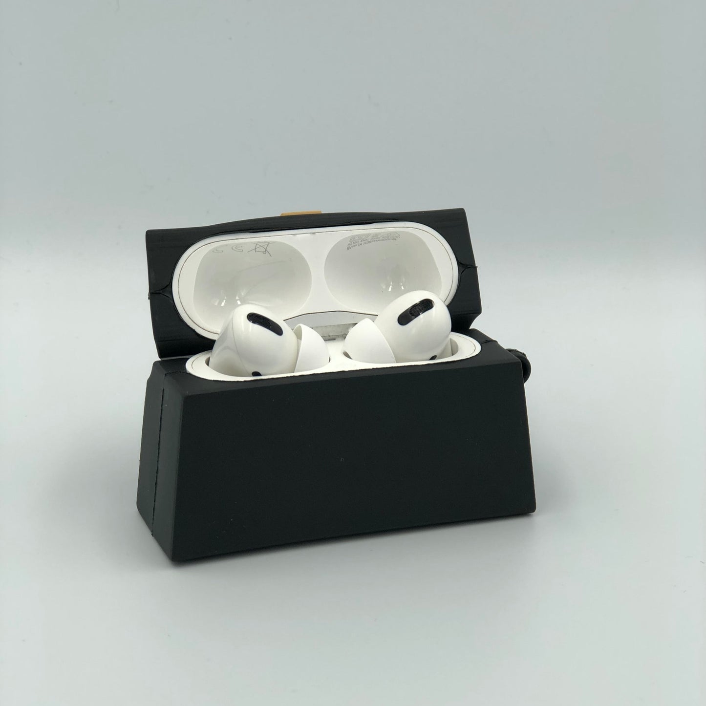 Black Silicone Handbag Airpod case - open view.  Apple AirPods and Apple Airpod case are for reference only and are not included.