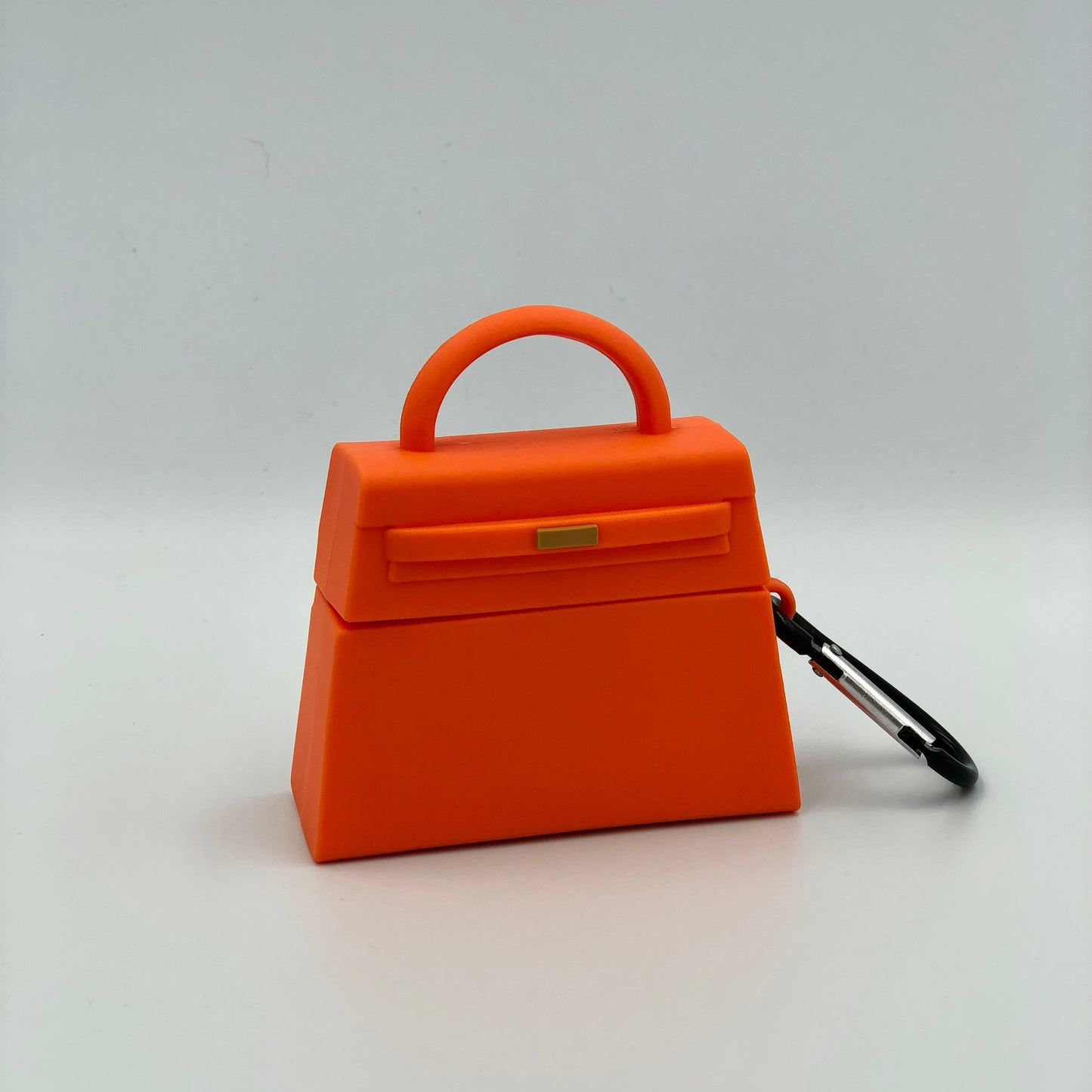 Orange Silicone Handbag Airpod Case - Keychain view. Apple AirPods and Apple Airpod case are for reference only and are not included.