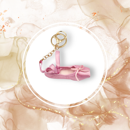 Pink Ballet Slipper handbag charm with gold background